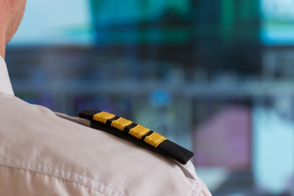 closeup of pilot's epaulettes in cockpit